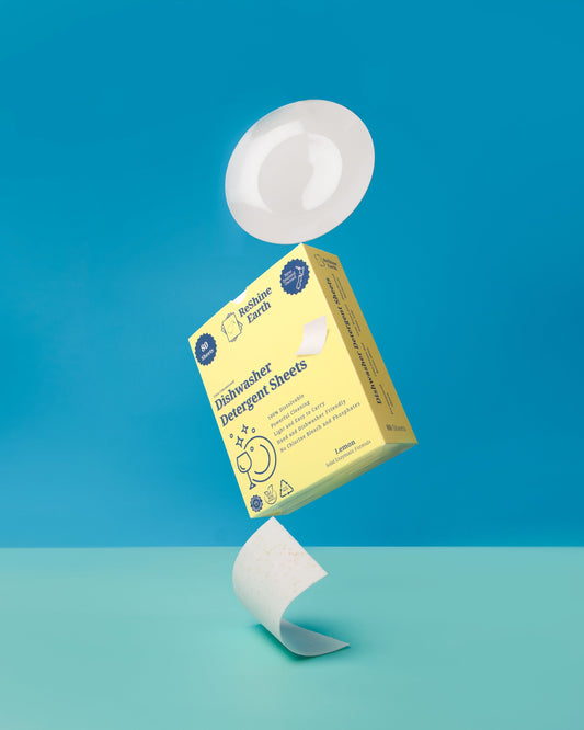 ReShine Earth plant-based dishwasher detergent sheet dissolving in dishwasher